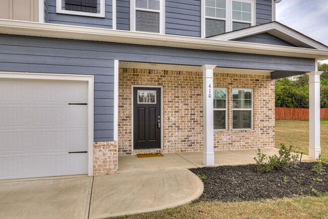 Photo - Discover comfort and convenience in this spacious 4-bedroom home, brimming with amenities, locate...