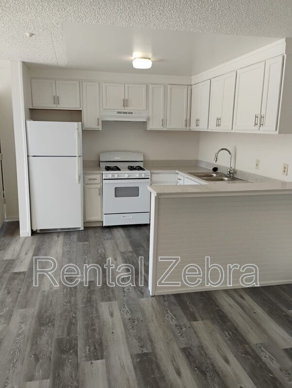Building Photo - 1440 Southwest Blvd Unit #14 Rental