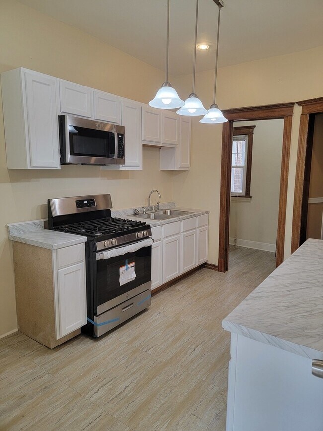 Photo - 6328 S St Lawrence Ave Unidad 2