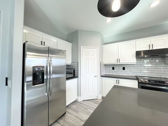 Photo - Welcome to a stunning 4-bedroom, 3-bath Home