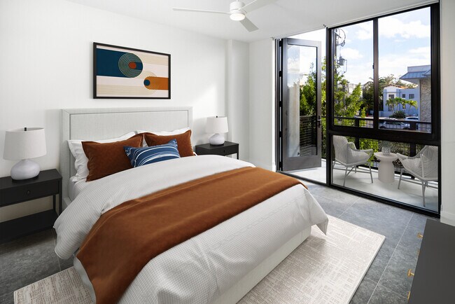 Signature Collection Townhome primary bedroom with balcony