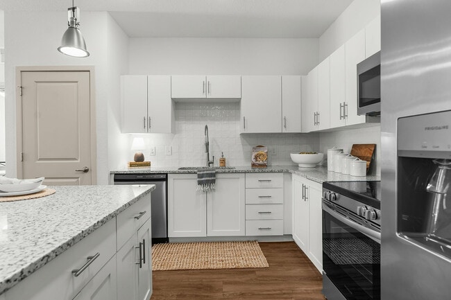 Experience the elegance and functionality of this modern kitchen design.