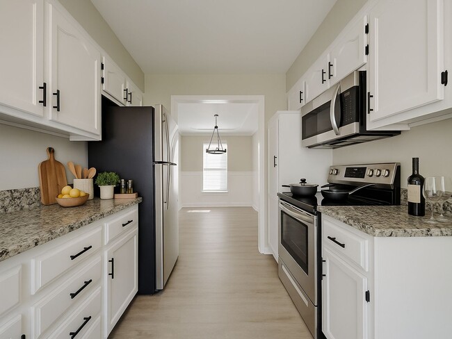 Photo - Charming 3-Bed, 2-Bath Home in Lee’s Summit | Cul-de-Sac, Fireplace & Fenced Yard