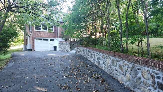 Photo - Elegant Multi-Level Brick Residence with O...
