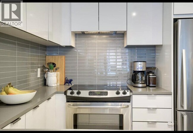 Photo - 9877 University Crescent Unit 103