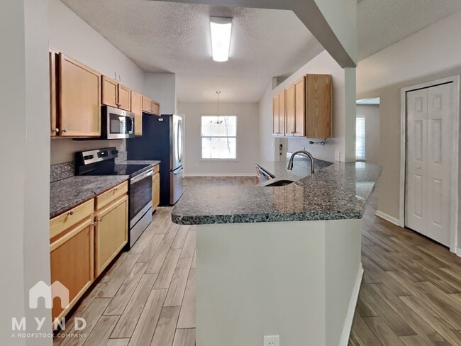 Building Photo - 7637 Invermere Blvd N Rental