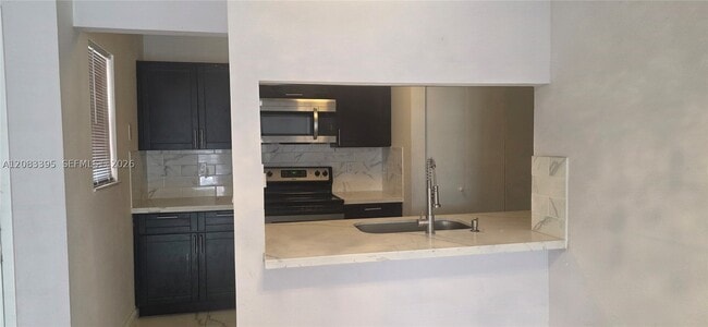 Photo - 900 NE 209th Terrace Unit 203-31