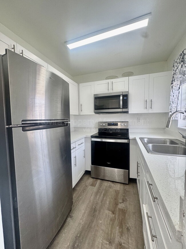 Photo - 5889 W 26th Ave Unidad 5897