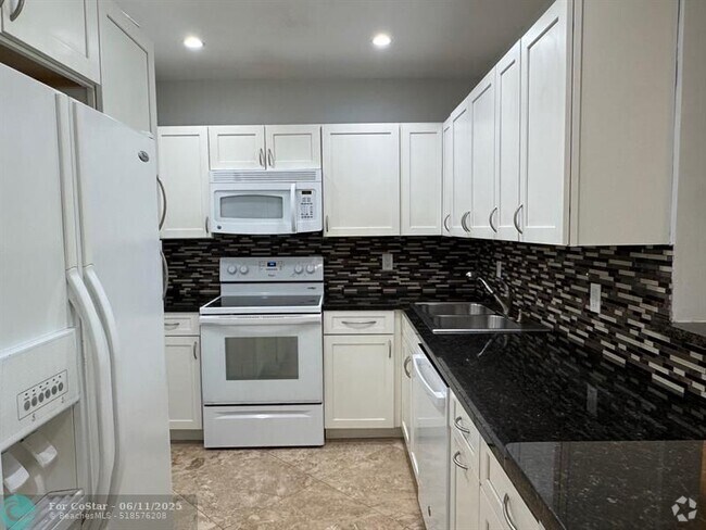Building Photo - 5700 NE 22nd Way Unit 328 Rental