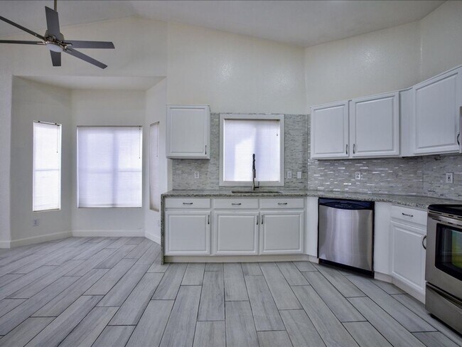 Photo - Spacious 3-Bedroom Home with 3-Car Garage & Large Backyard