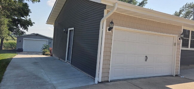 Photo - Charming 4-Bedroom Haven with Hardwood Elegance on Main St, New Prague!