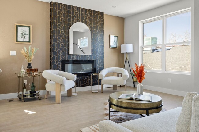 Building Photo - MOVE IN INCENTIVES!! Bright & Spacious End-Unit Townhome with Garage, private yard area, and Pet...