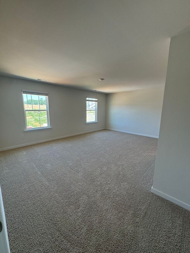 Photo - Stunning Brand-New 4BR Home with Modern Luxury Throughout