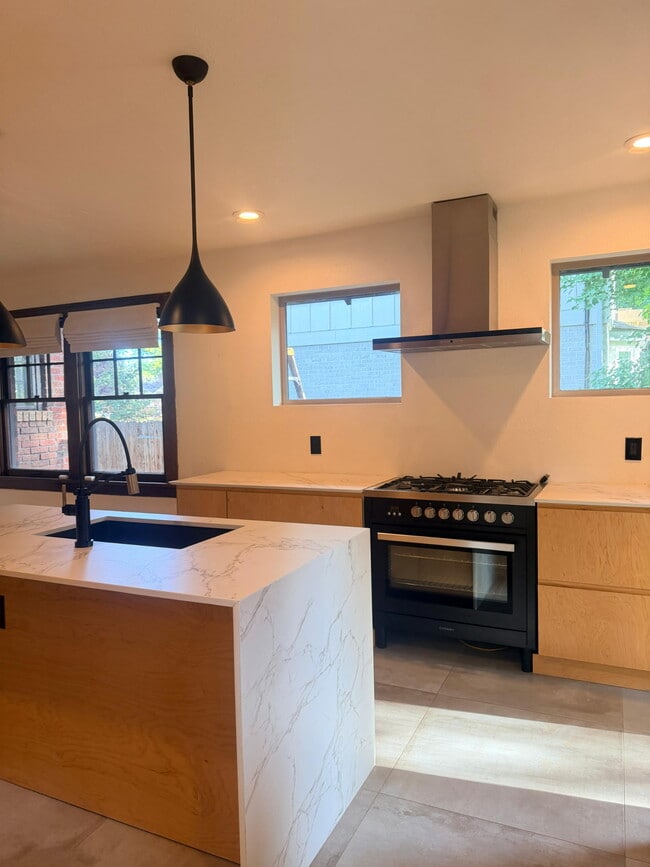 A dream chef's kitchen with brand new gas stove and gas oven!
