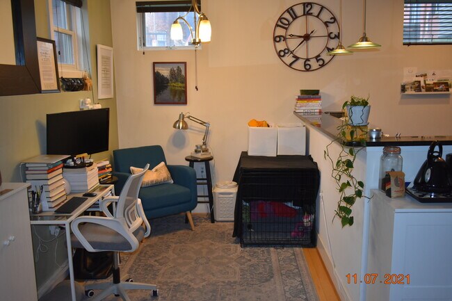 Open floor plan with nook for dining room table or home office. - 1425 11th Street Northwest Unit 104