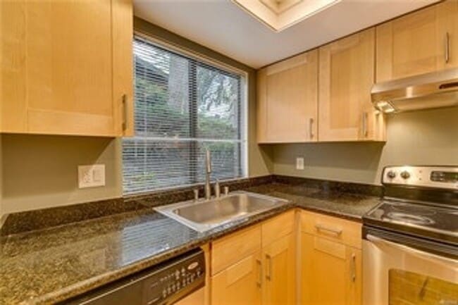 Photo - Freshly Updated 3BR Condo w/ Cozy Fireplace, Deck & 2 Parking