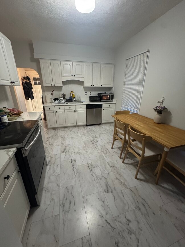 Kitchen w/ new appliances + countertops - 44 Russell Rd Unit 2