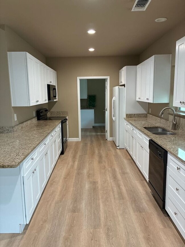 Photo - 5BR/3BA w/ Front Yard + Assigned Parking in Kingsbury, TX