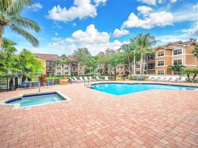 Building Photo - 9001 Wiles Rd Unit 103-3