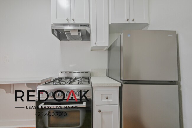 Photo - Sophisticated Studio with Exposed Brick Wa... Unit 106