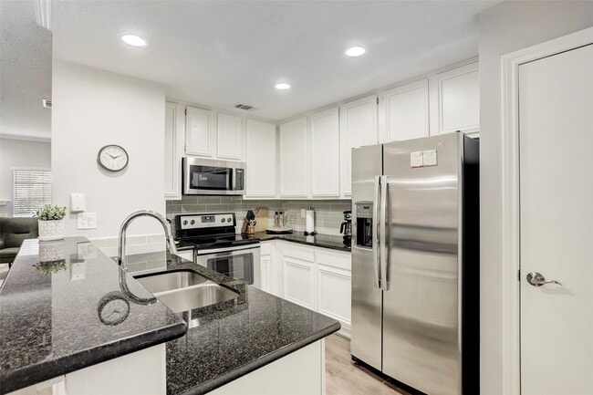 Building Photo - 1911 Bering Dr Unit 34