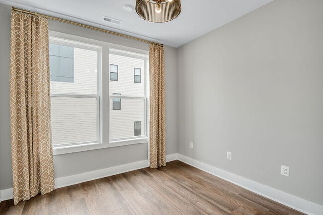 Photo - Expansive 3-Bedroom Condo featuring 2.5 Ba... Unit B