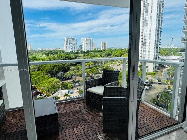 Building Photo - 3731 N Country Club Dr Unit 928