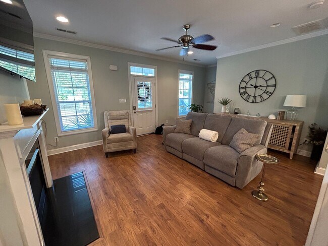 Photo - Enjoy private living in this beautiful 3 bedroom, 2.5 bathroom home on almost half acre lot!