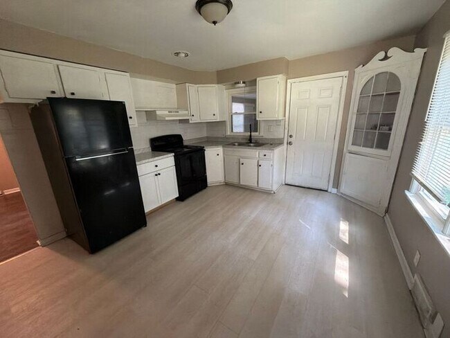 Spacious 4-Bedroom Home with Garage & Breezeway