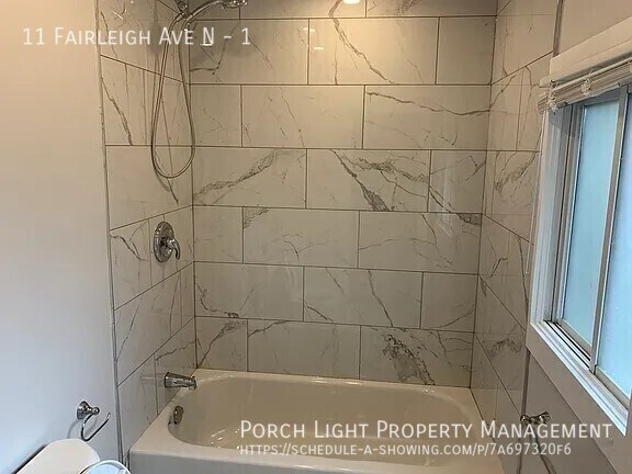 Photo - Main Floor 2 Bedroom with Parking, Yard and great deck Unit 1