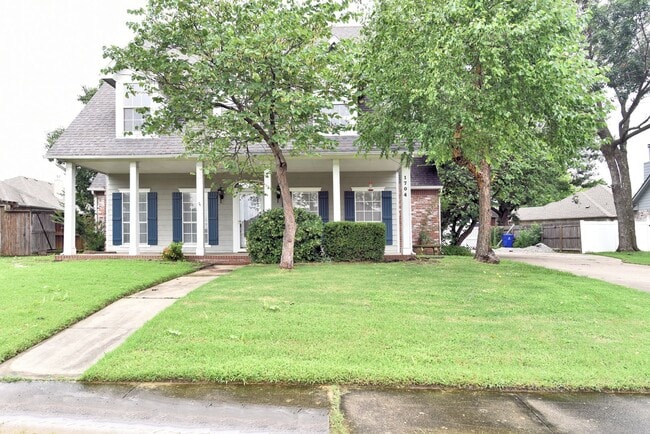 Building Photo - Look at that amazing Front Porch!! Room to gather inside and out.