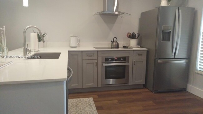 Building Photo - 6091 NW 61st Ave Unit 210 Rental