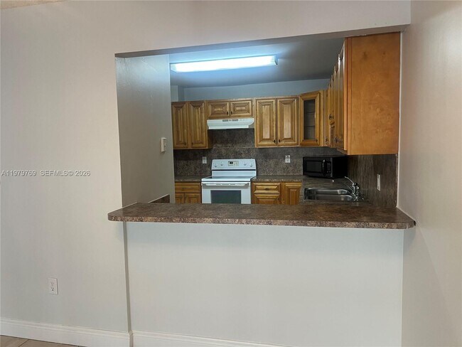 Photo - 6950 Miami Gardens Dr Unit 2-117