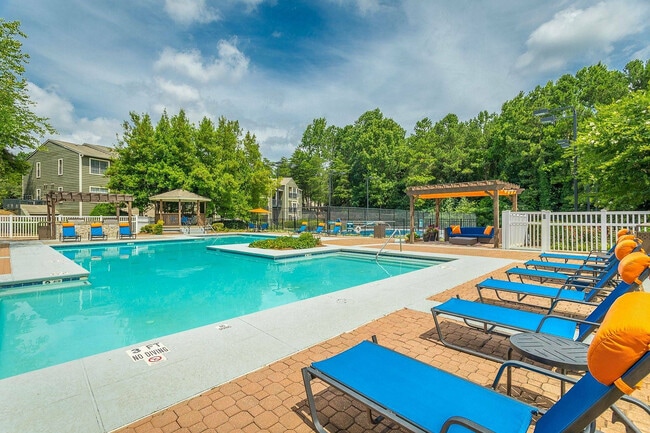 Enjoy sunny afternoons by our sparkling resort-style pool at Avenues of Kennesaw. - Avenues of Kennesaw Rental