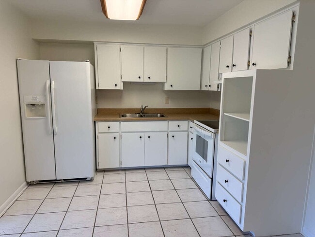 Photo - "Charming 2-Bedroom Retreat with optional studio on Coral Avenue – Cozy Comfort Awaits in Kissimm...