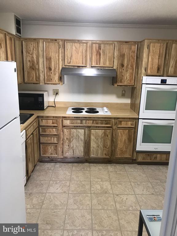 Building Photo - 8350 Greensboro Dr Unit 402