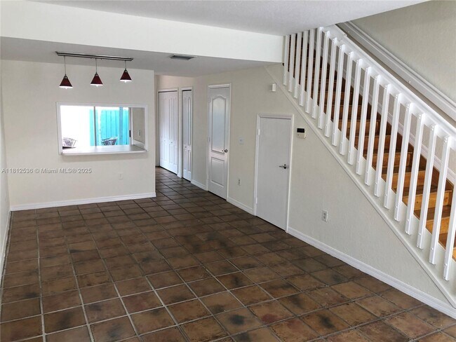 Photo - 9837 W Okeechobee Rd Condo Unit 401