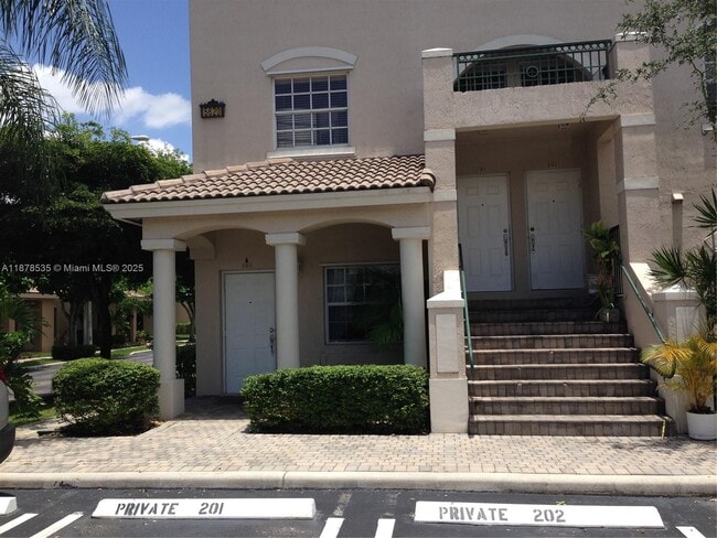 Building Photo - 5620 NW 114th Path Unit 201