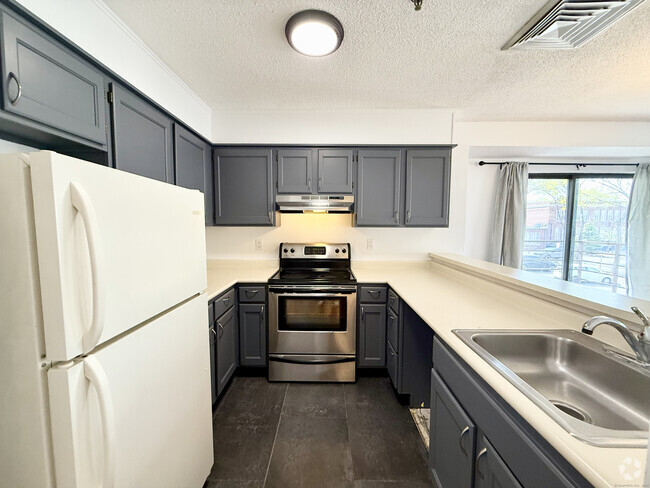 Building Photo - 1204 Whitney Ave Unit APT 201