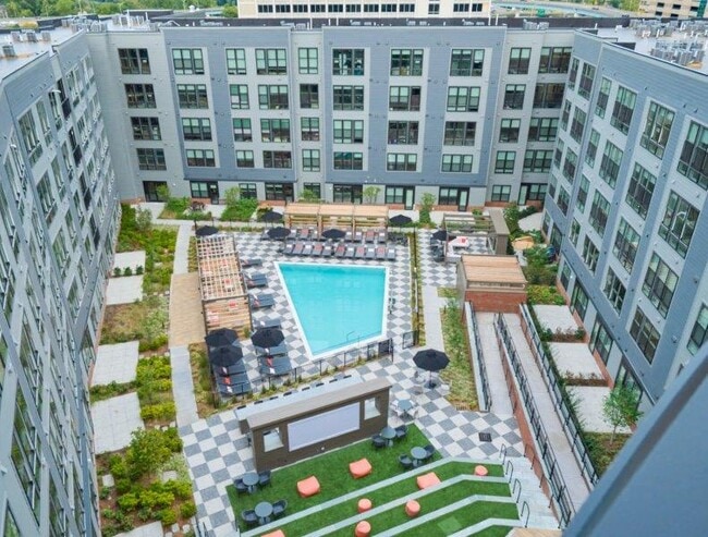 Central Courtyard - Pool and Lounge Area - The Pennant at North Crossing Apartments