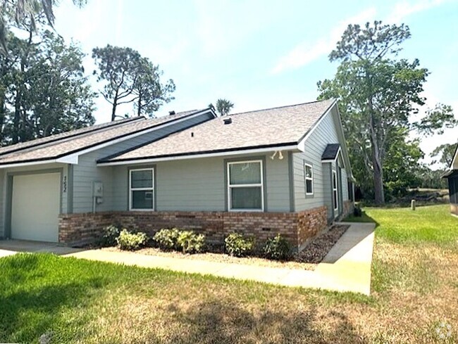 Building Photo - Beautifully Remodeled Pelican Bay Townhome!