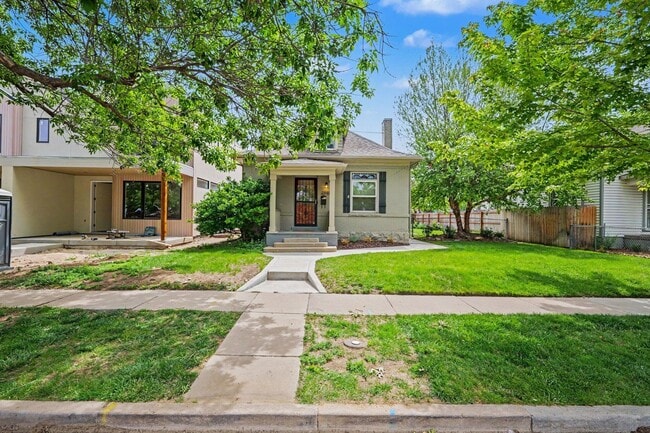 Building Photo - Beautifully Preserved Englewood Home with Fenced Backyard