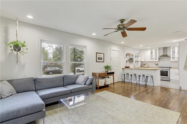 Open Concept Kitchen to Living Room with Hardwood Flooring, Ceiling Fan - 5715 Joe Sayers Ave House