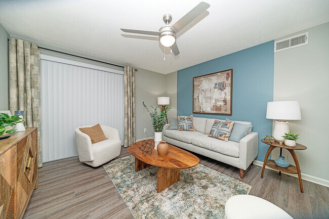 Spacious living room with hardwood-style flooring - Vetra Providence
