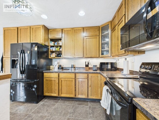 Building Photo - Great Four Bedroom! First Month Half Off!!