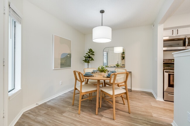 Dining Area with Modern Light Fixture - Diamond Interior