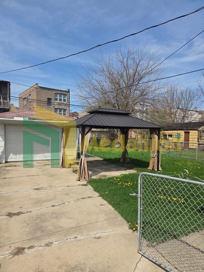 Photo - Spacious 4-Bedroom Home with Finished Basement and Yard Space