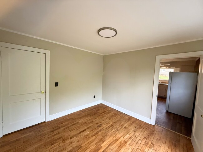 Photo - Spacious 2 Bed House | Private Patio + Sliding Door Dining Area