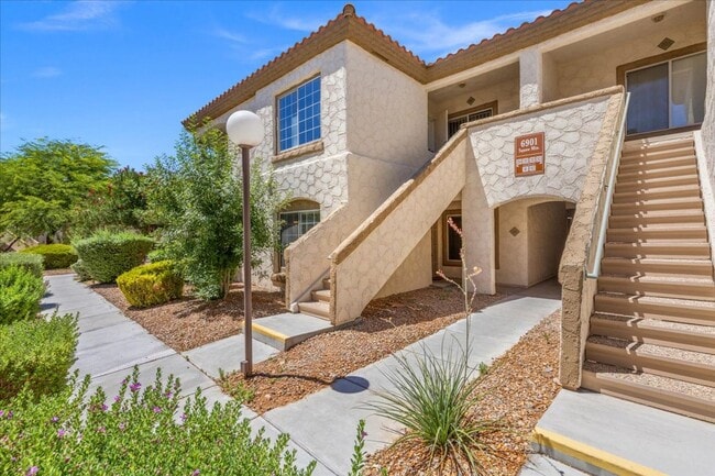 Building Photo - Sleek 2 Bedroom Condo with 2 Car Garage Ne...