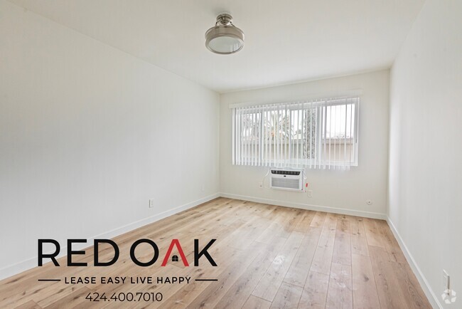Building Photo - 410-414 1/2 Manhattan Pl-0-204 Unit 0-204 Rental